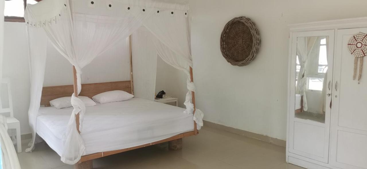 The Village Rua Beach Homestay Exterior photo