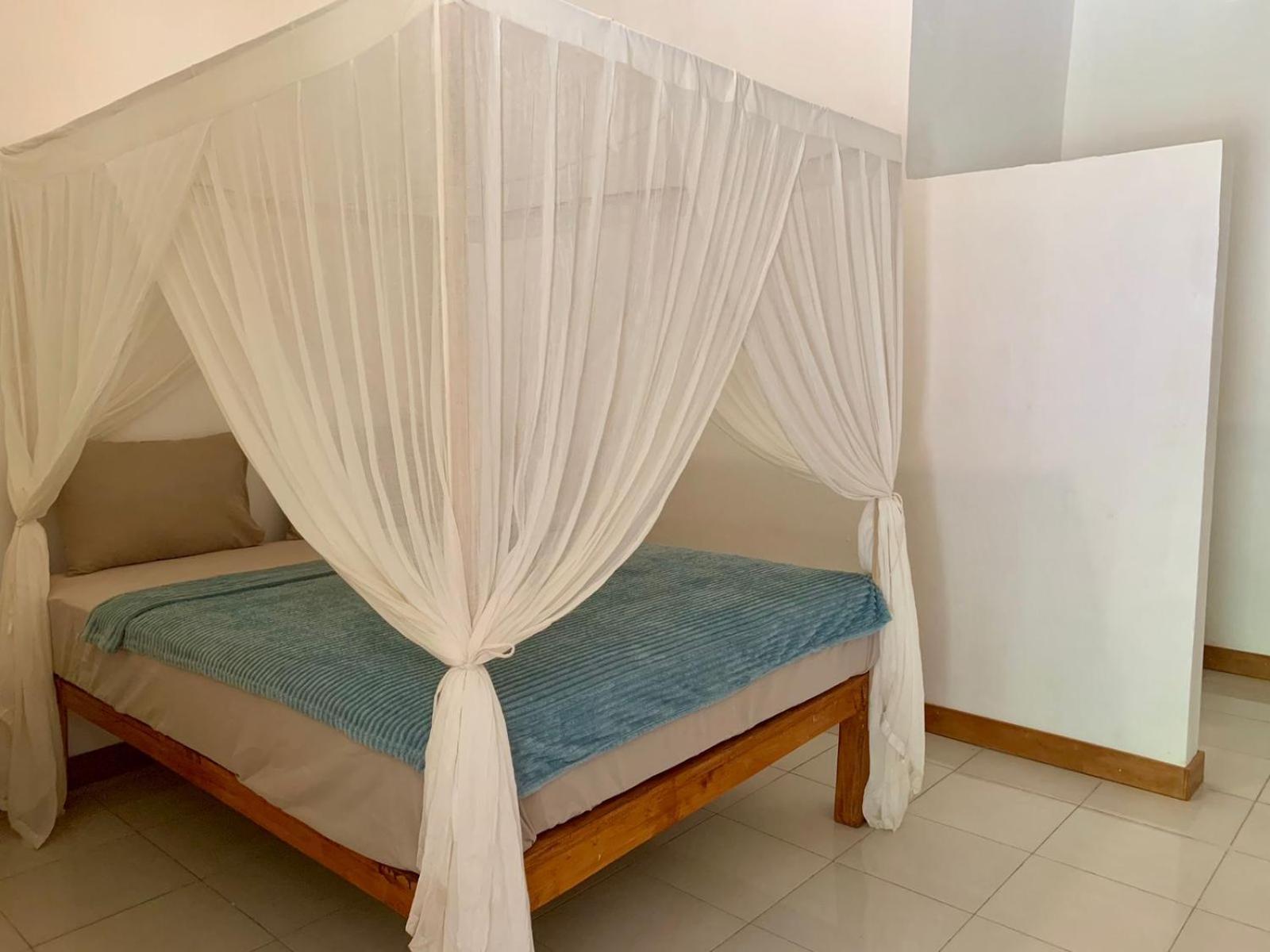 The Village Rua Beach Homestay Exterior photo